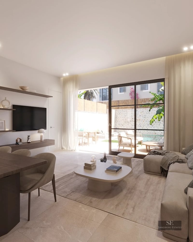 Spacious living room with large windows, terrace with pool and sea views. Modern, bright and elegant design. Ideal for relaxation.