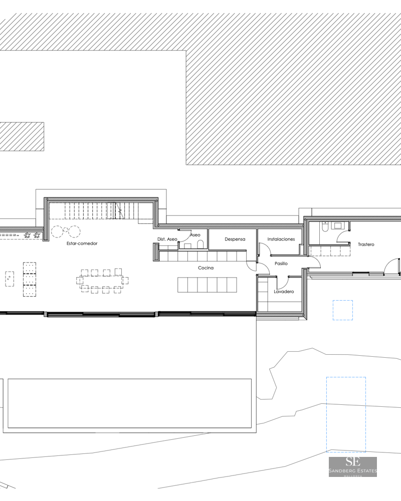 Plan architectural en 2D montrant la disposition du salon, de la cuisine et des zones de service.