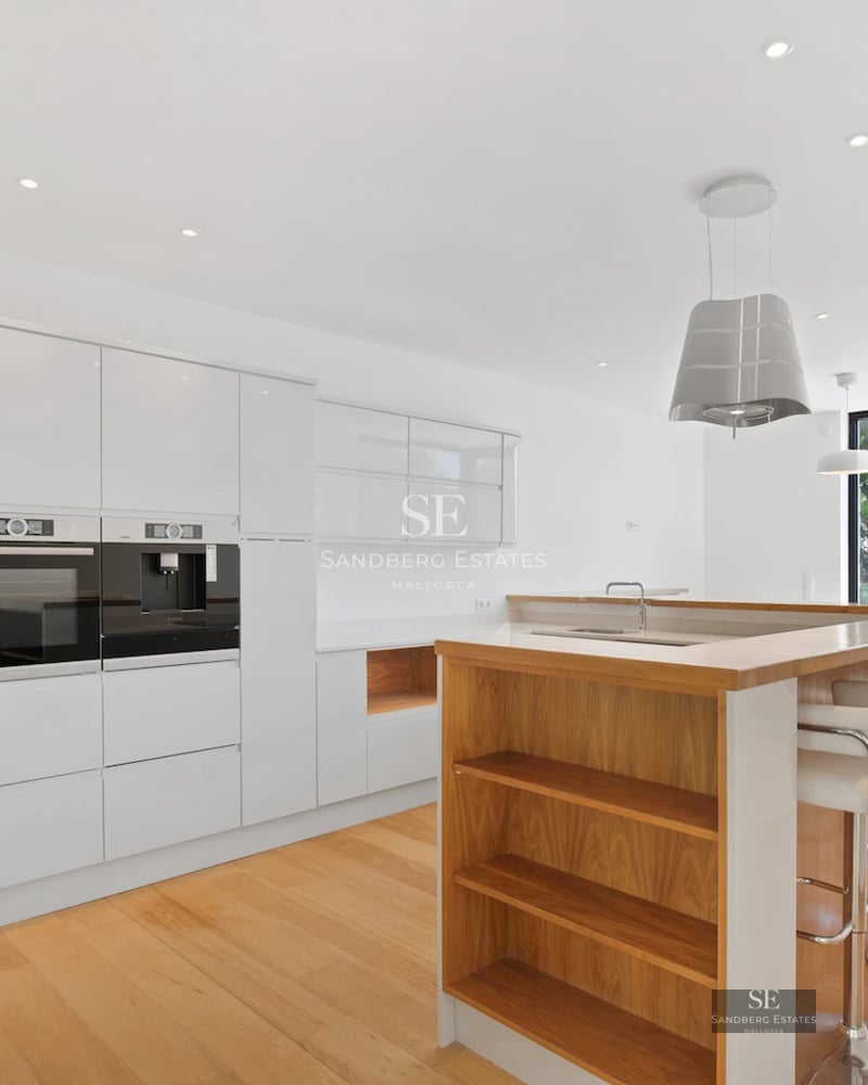 Exterior view of a modern villa with reflecting pool. Minimalist architecture, clean lines, and abundant natural light.