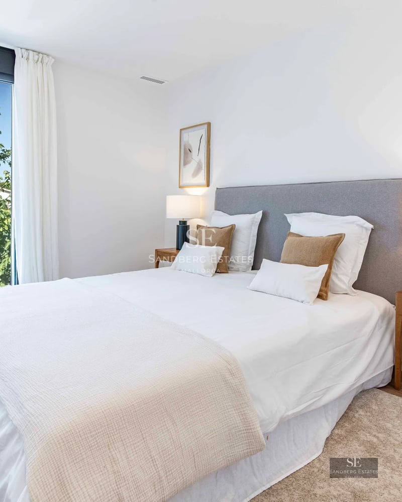 Modern villa facade with pool. Large windows, minimalist landscaping, and abundant natural light. Contemporary architecture.