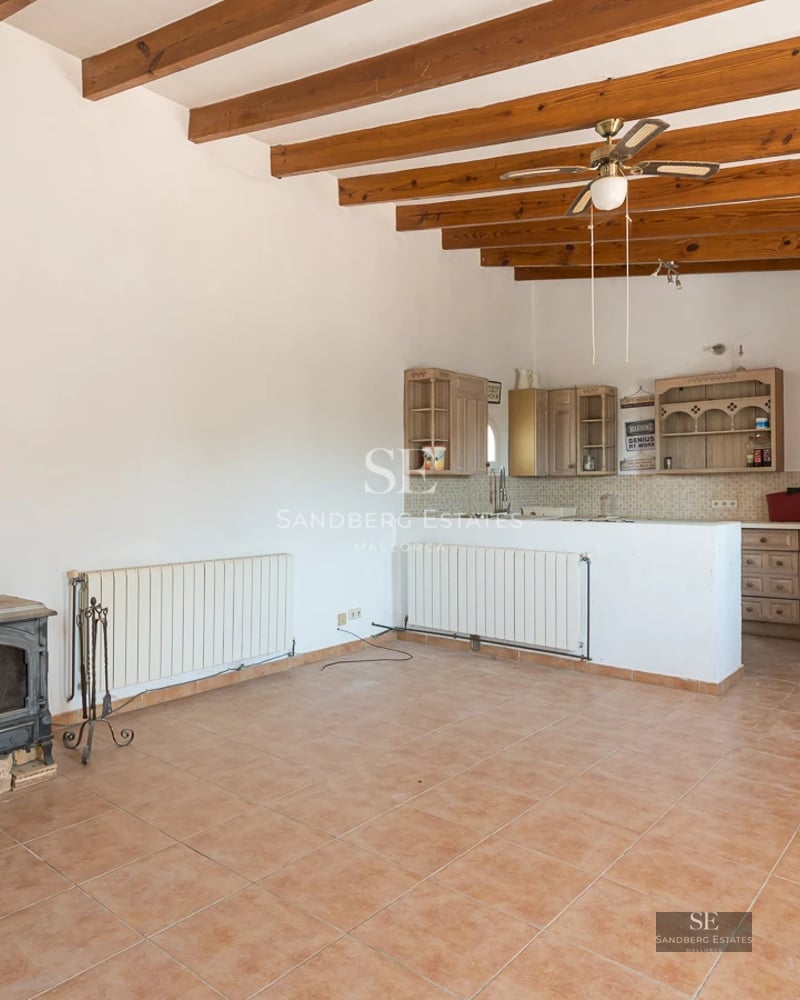 Spacious pool with sunny terrace, sun loungers, and lush greenery. Modern architecture with large windows.