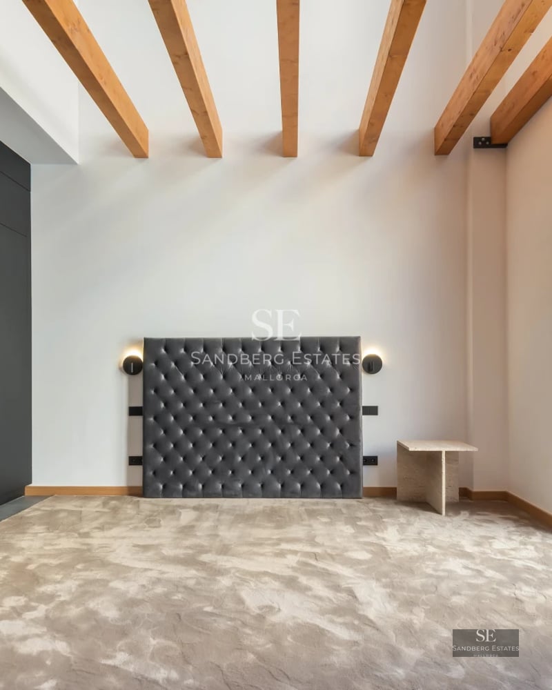 Exterior view of a modern villa with infinity pool and lush garden. Minimalist architectural design with large windows.