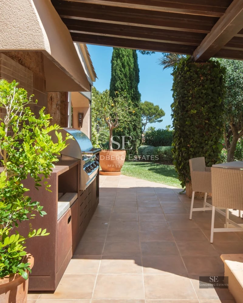 Modern facade featuring a pool, expansive windows, and lush garden. Minimalist architecture with clean lines and natural lighting.