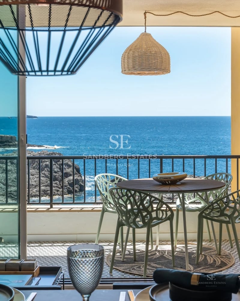 View of a modern pool with sleek design and lounge area. Well-maintained garden in the background. Ideal for relaxation and recreation.