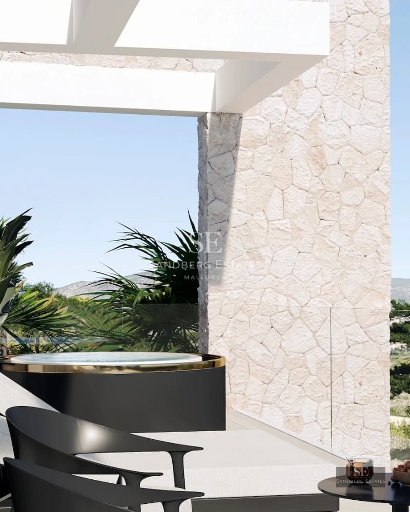 Large infinity pool surrounded by a lush garden and sunny terrace. Modern design with spectacular views.