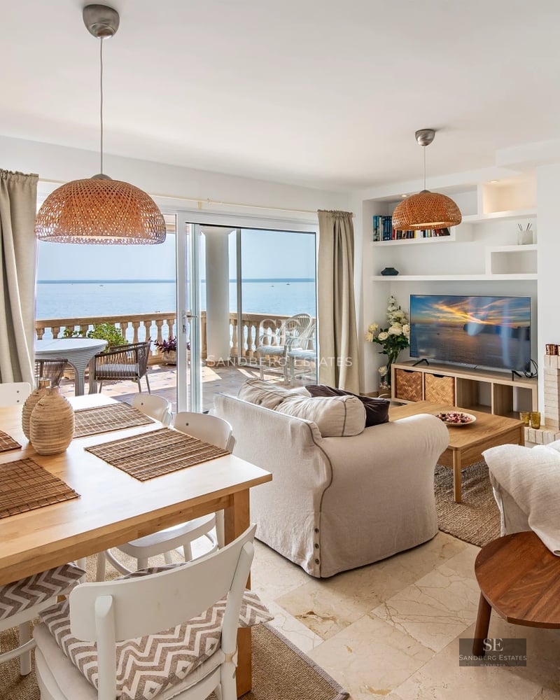 Exterior view of a modern home with a pool, garden, and large window. Minimalist design with high-quality finishes.