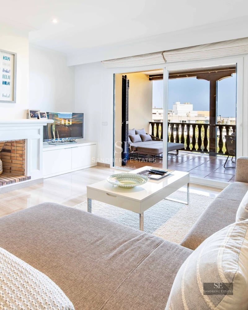 Panoramic view from modern penthouse with balcony, infinity pool and stunning Mediterranean Sea views. Sleek design with natural light.