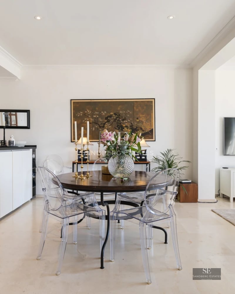 Expansive terrace with infinity pool, sun loungers, panoramic views, and minimalist modern architecture. Elegant and relaxing design.