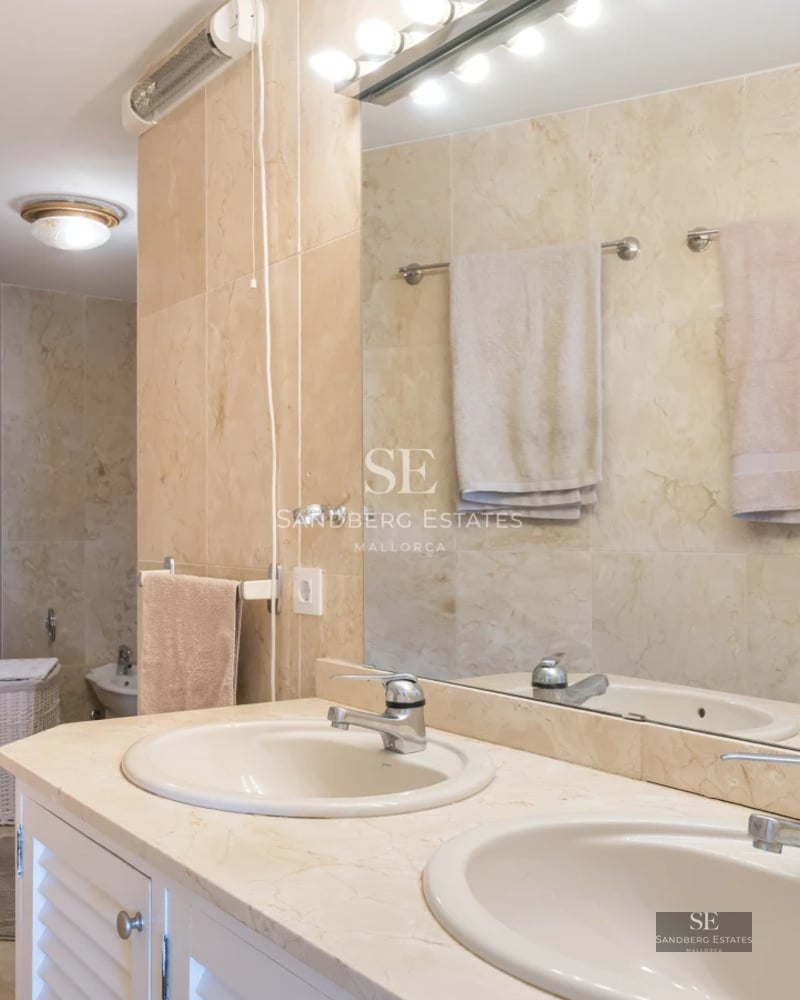 Exterior view of a modern villa with a pool, garden and large windows offering panoramic views. Minimalist architectural design.