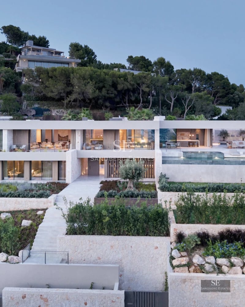 Expansive terrace with infinity pool, elegant lounge chairs, and panoramic views. Modern design with clean lines and luxury finishes.