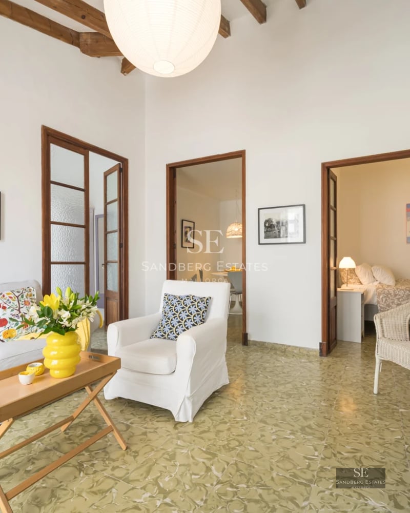 Modern penthouse featuring large windows, a balcony with sea views, designer furniture, and high-end finishes. Bright and spacious.