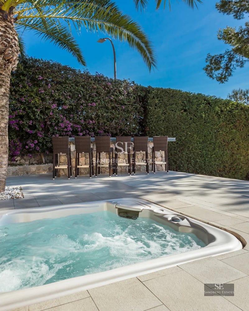 Spacious terrace with infinity pool, sun loungers, and panoramic views. Modern architecture, clean lines, and abundant natural light.