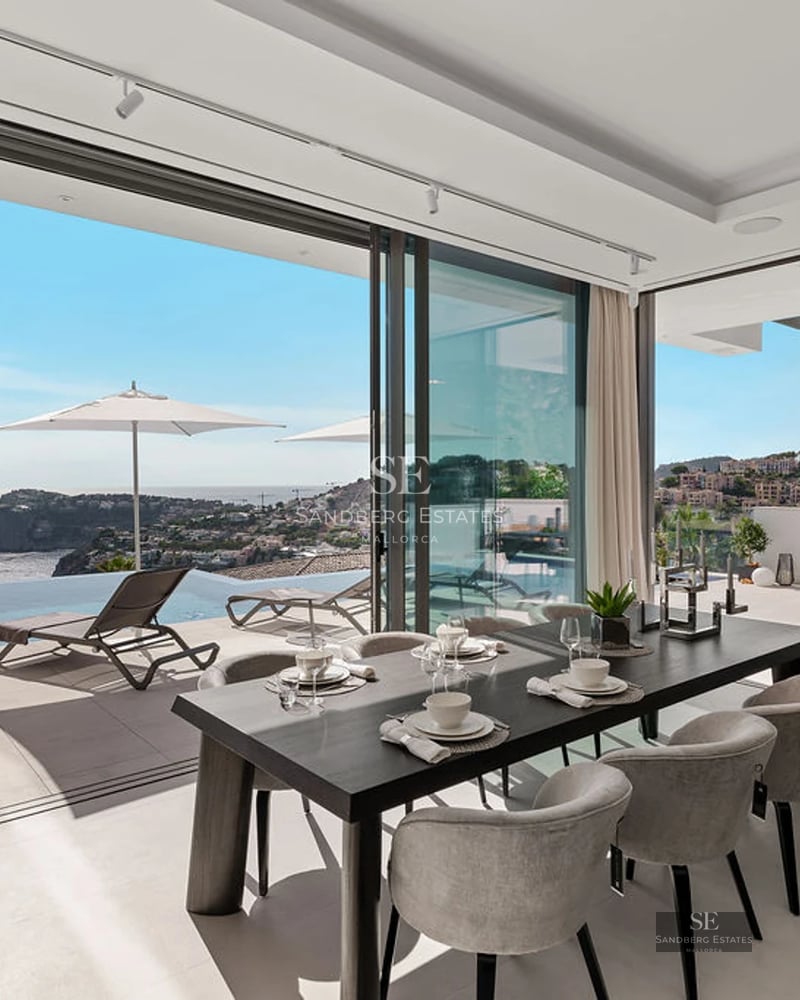 Spacious terrace with infinity pool, panoramic sea views, modern furniture and minimalist design. Perfect for relaxation.