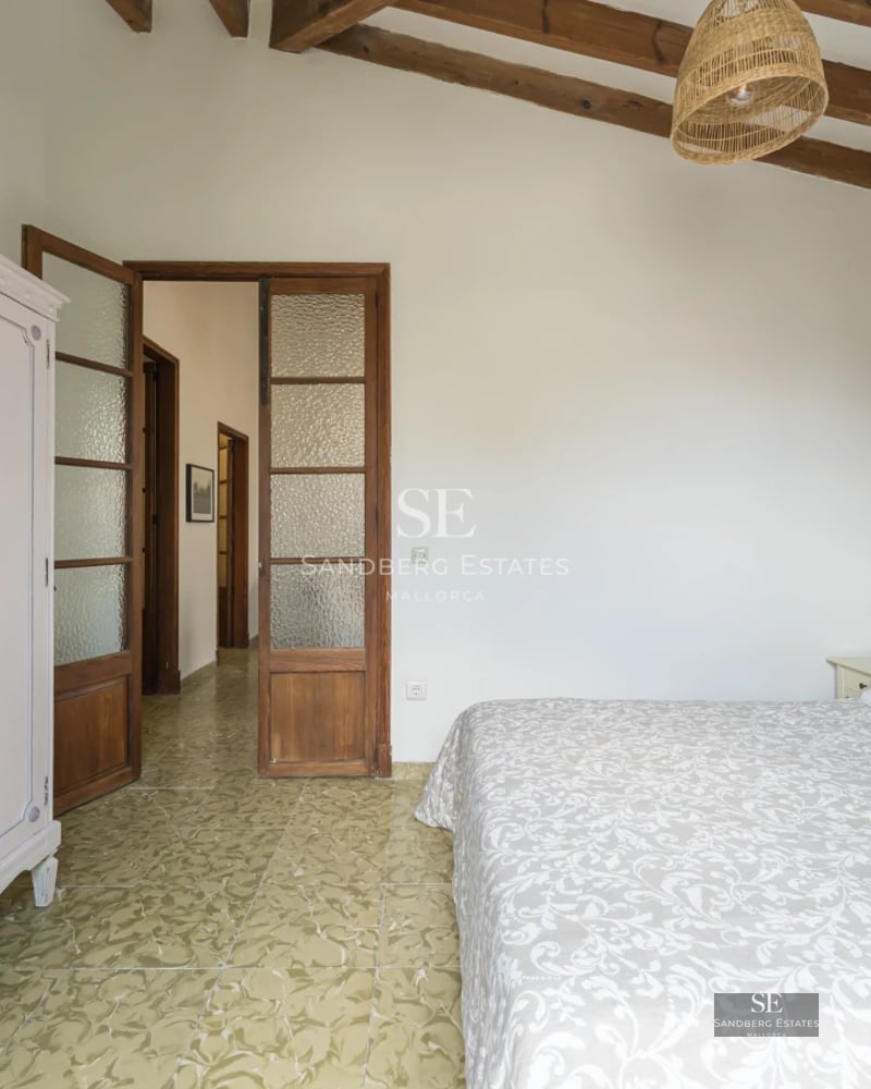 Spacious terrace with infinity pool, sun loungers, and panoramic views. Modern design with glass and wood. Abundant natural light.