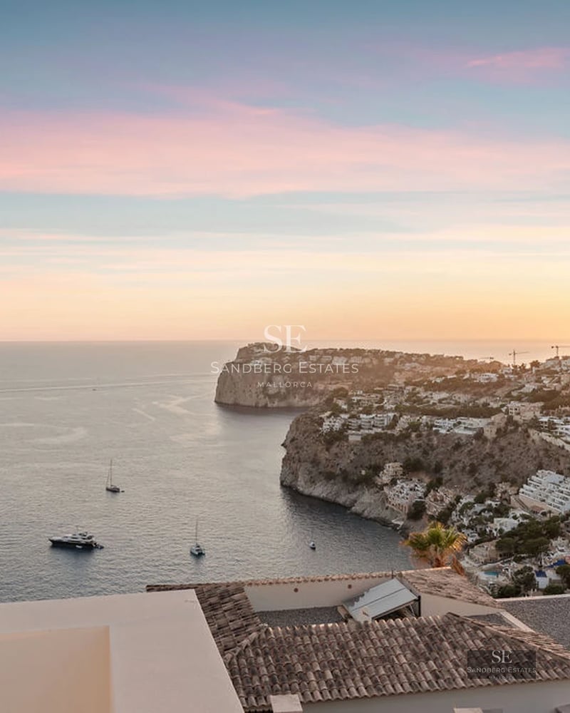 Modern terrace featuring an infinity pool, ocean views, sun loungers, and stylish outdoor furniture. Contemporary and minimalist design.