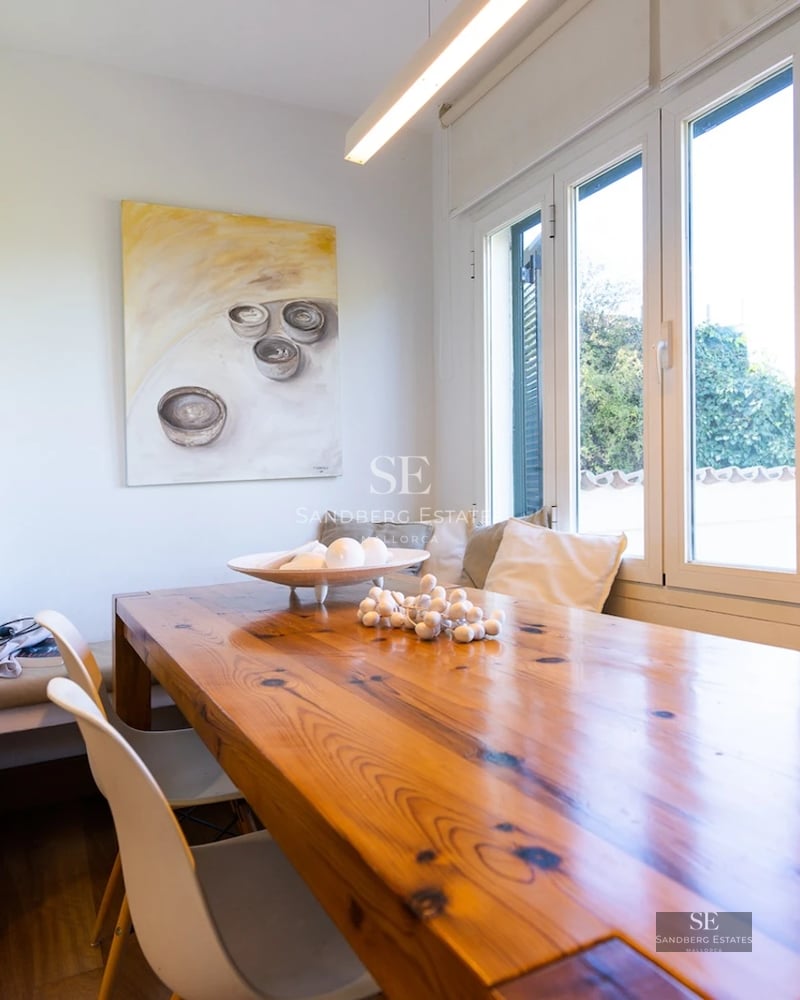 Expansive terrace with infinity pool and panoramic views. Modern architecture with clean lines and large windows.