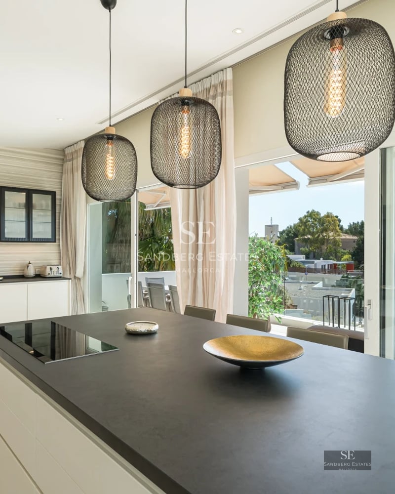 Exterior view of modern villa with infinity pool, terrace, and large windows. Minimalist design and lush gardens.