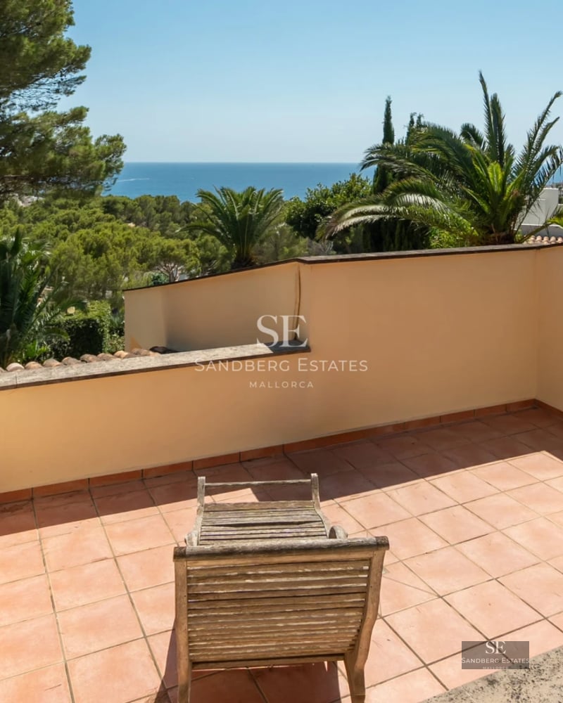 Expansive terrace with infinity pool. Modern architecture with clean lines and large windows. Minimalist design and panoramic views.