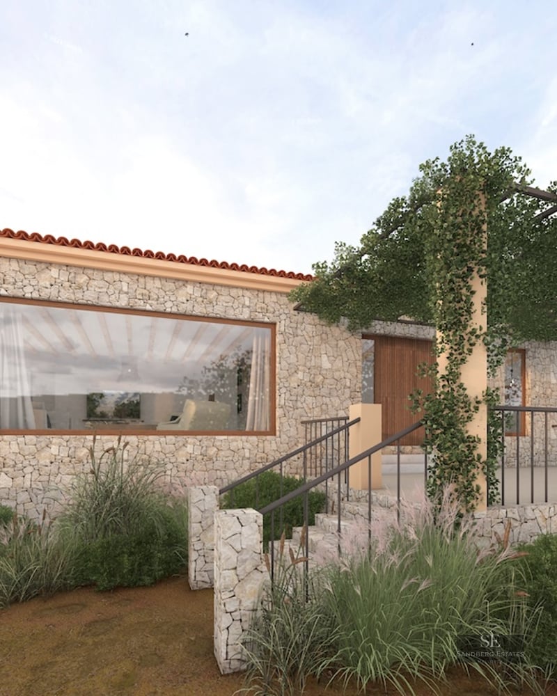 Modern stone villa facade featuring a vine-covered pergola, large windows, and natural Mediterranean landscaping.