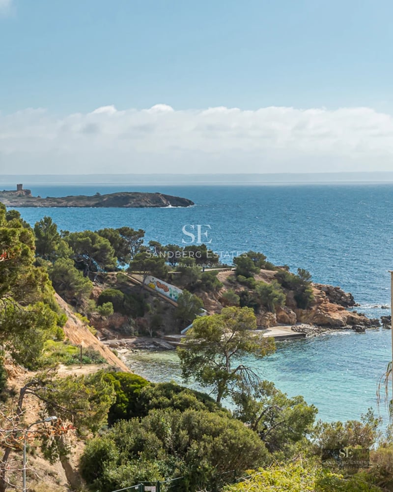 Exterior view of a modern villa featuring a pool, garden, and expansive windows. Contemporary design, ambient lighting and high-quality finishes.