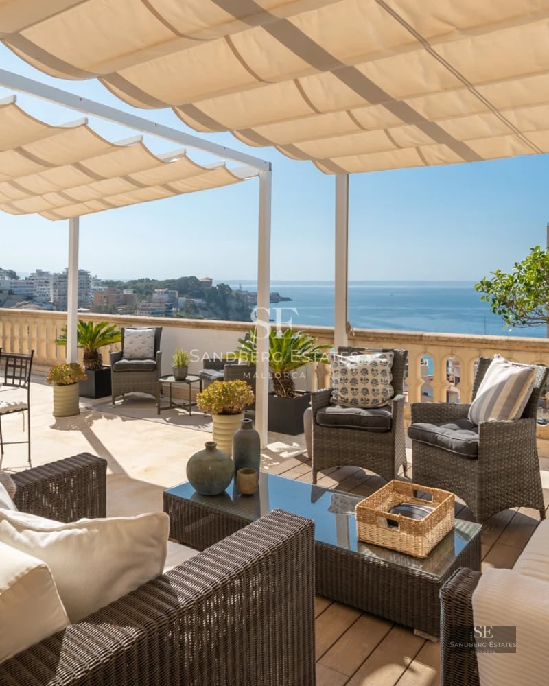 View of modern villa with infinity pool, stylish loungers, lush garden, and large windows. Minimalist architecture and luxurious finishes.