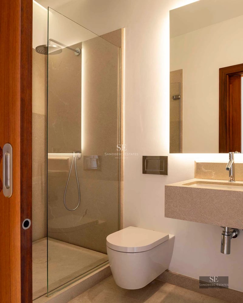 Spacious living room with panoramic sea views. Modern design, natural lighting and elegant furniture.