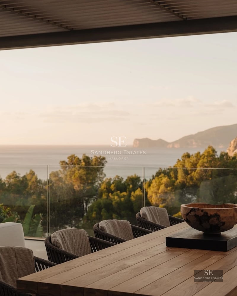 Exterior view of a modern house with a pool, lush garden, and large windows. Minimalist design with clean lines.