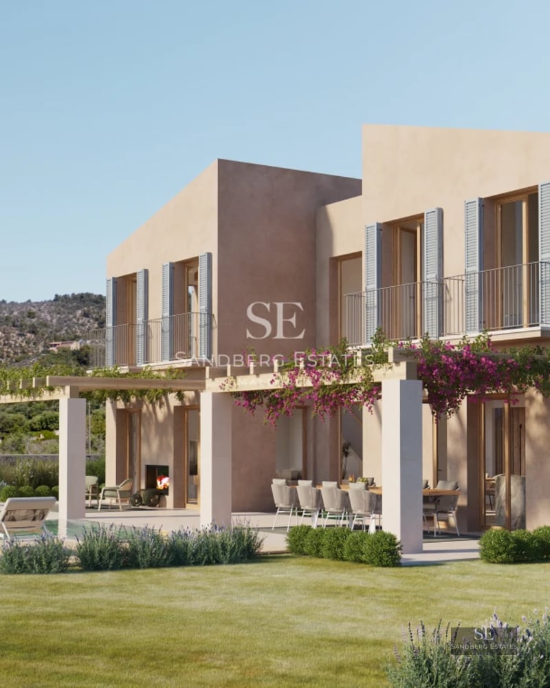 Spacious living room with panoramic windows, designer sofa and sea views. Natural lighting, elegant and modern.