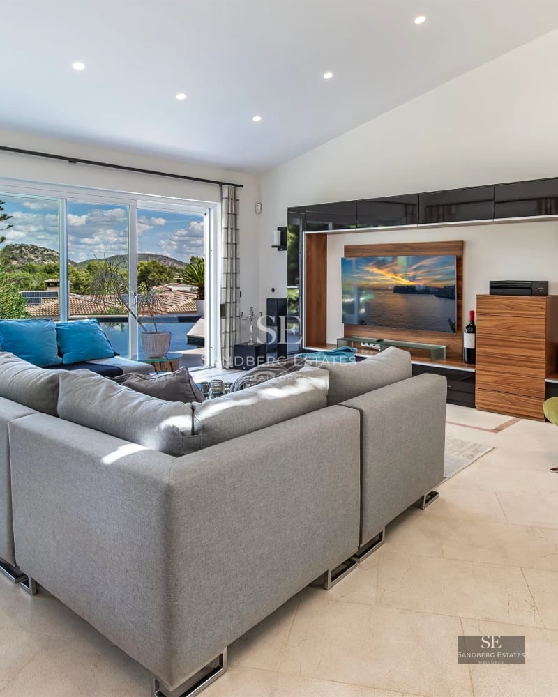 Expansive terrace with infinity pool, sun loungers, and panoramic views. Modern design with clean lines and abundant natural light.