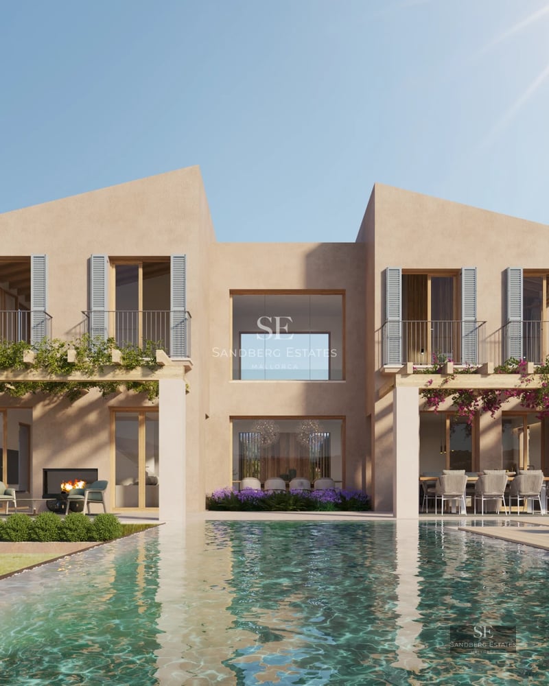 Spacious living room with fireplace, large windows and access to terrace. Modern design with stone and wood accents. Abundant natural light.