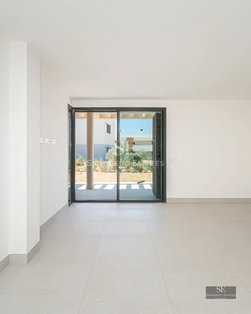 Expansive terrace featuring an infinity pool with panoramic views. Modern, minimalist architecture. Ambient lighting.