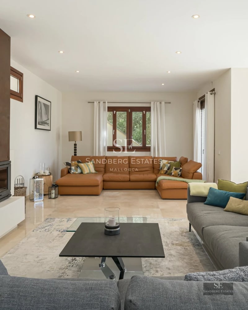 Spacious balcony with panoramic sea views. Elegant outdoor furniture. Modern design with abundant natural light.