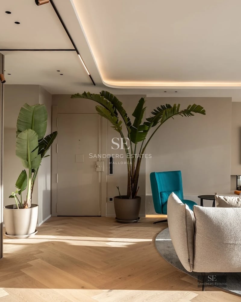 Spacious living room featuring floor-to-ceiling windows, light wood floors, modern fireplace, and access to a terrace with a pool. Minimalist, elegant design.