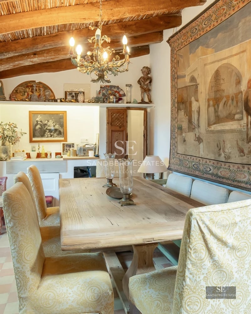 Spacious terrace with infinity pool, sun loungers, and sea view. Modern design featuring sleek glass railings.