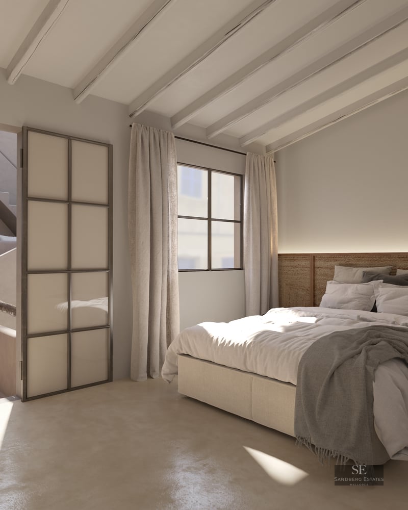Modern Mediterranean bedroom with exposed white ceiling beams, a rattan headboard, and polished concrete floors.