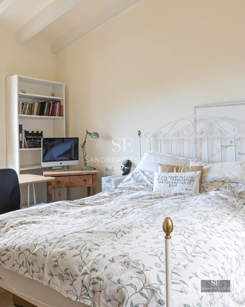 Modern interior with balcony and sea view. Elegant furniture, natural light and minimalist design. Large windows and high-quality materials.