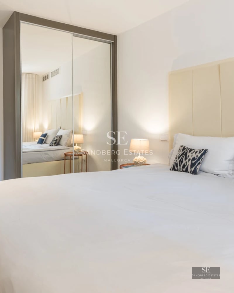 Spacious terrace with infinity pool, sun loungers, and panoramic views. Modern architecture with clean lines and elegant finishes.