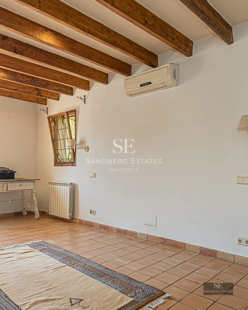 Spacious terrace featuring an infinity pool, ocean view, modern furniture, and lush vegetation. Contemporary architectural design.