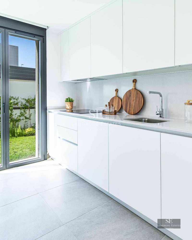 Stunning sea view from terrace with infinity pool. Modern, elegant design with glass railing.