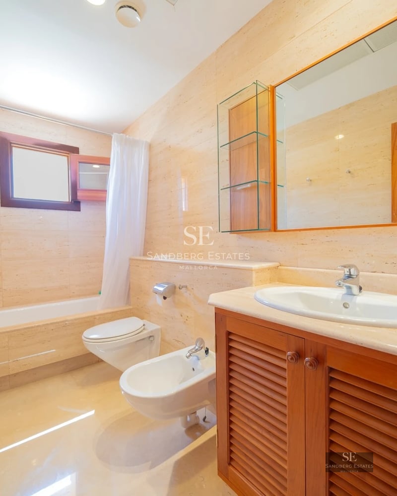 Property view with infinity pool. Minimalist design. Large windows. Serene landscape. Wood and stone.