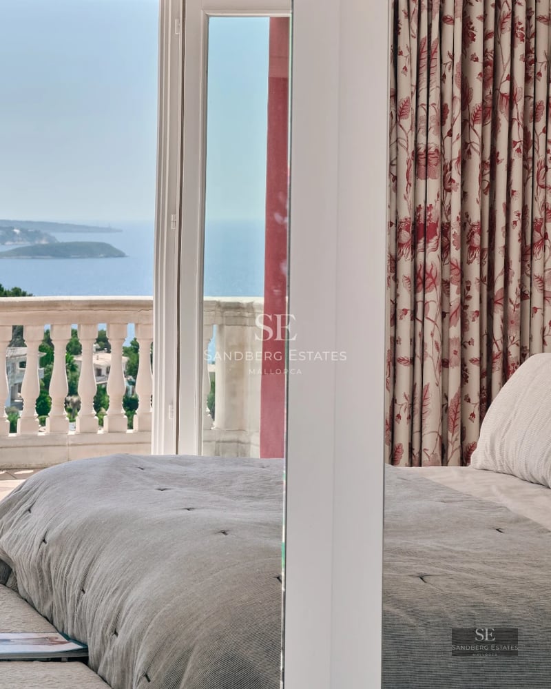 Spacious balcony with ocean views. Modern and elegant furniture. Seamless indoor-outdoor living. Abundant natural light.