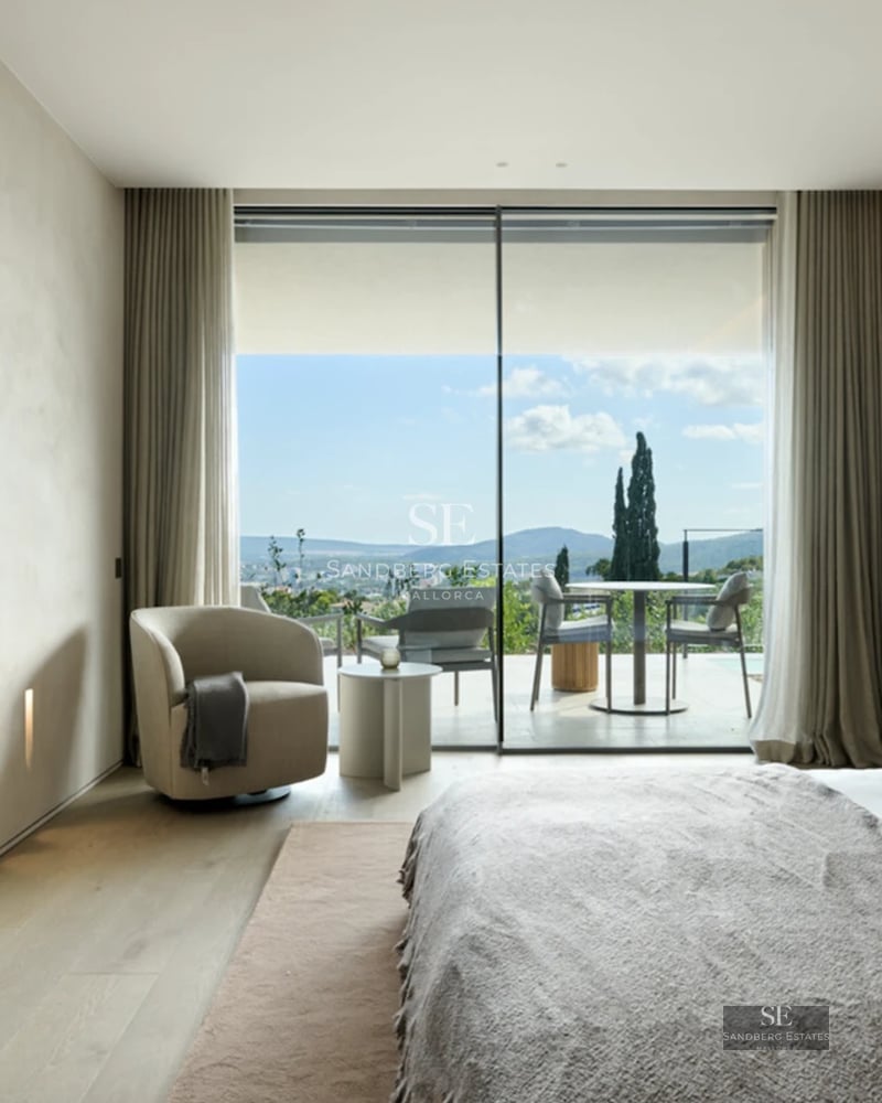 Exterior view of a modern villa featuring an infinity pool, lush garden, and expansive terraces. Minimalist architecture with clean lines.