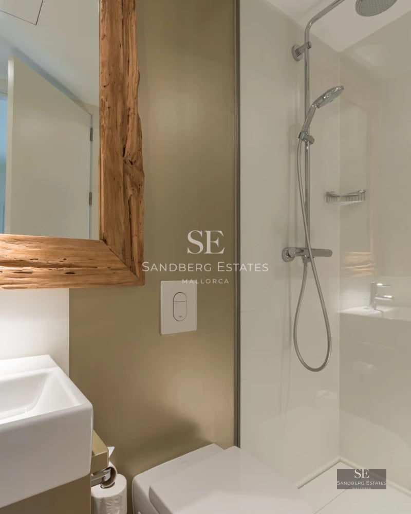 Exterior view of a modern house with a pool, garden, and terrace. Minimalist architecture with large windows and high-quality finishes.