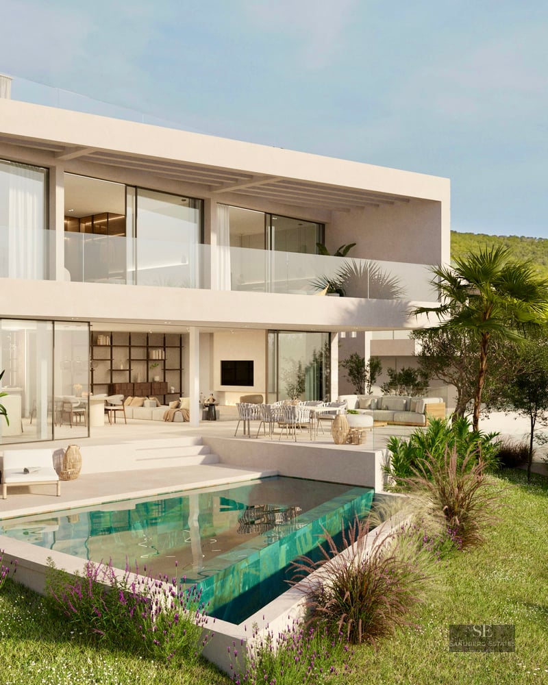 Modern two-story villa featuring a turquoise pool, glass balconies, and lush hillside gardens under a clear sky.