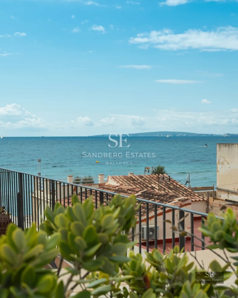Spacious terrace with infinity pool, sea view, elegant loungers, and modern architecture. Minimalist details and natural lighting.