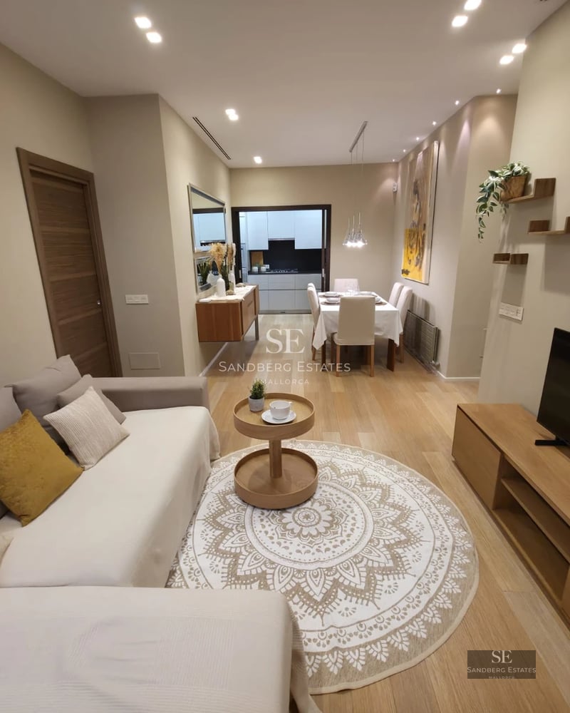 Exterior view of a modern villa featuring an infinity pool, expansive terraces, and lush garden. Minimalist architecture with large windows.