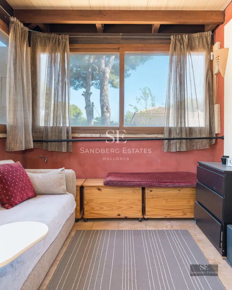 View of a modern villa with infinity pool, surrounded by greenery. Minimalist architecture, clean lines, and large windows.