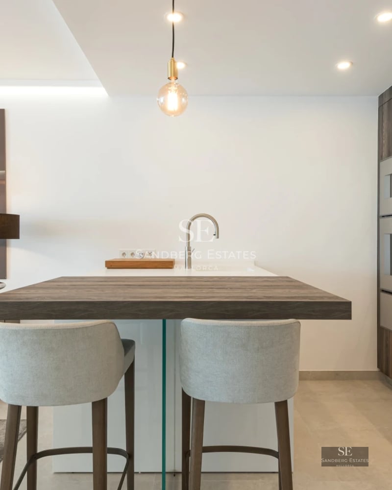 Exterior view of a modern home with a pool. Minimalist architecture, large windows and manicured landscaping. Abundant natural light.