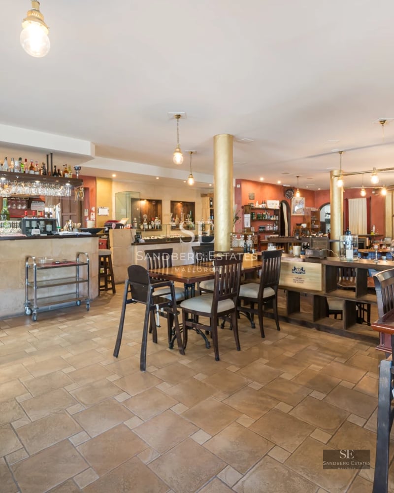 Expansive terrace featuring an infinity pool, sun loungers, and panoramic ocean views. Modern and elegant architecture.