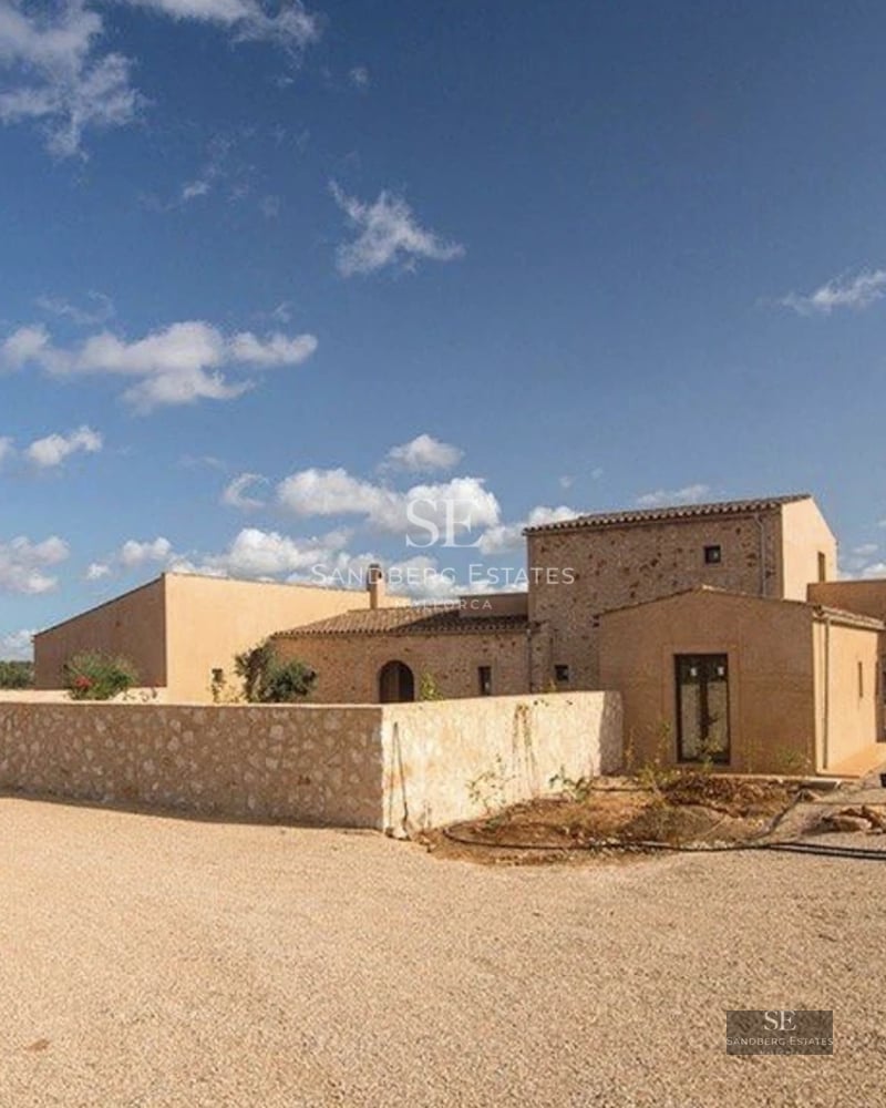 Spacious terrace with infinity pool, modern furniture, panoramic sea views, and minimalist architectural design.